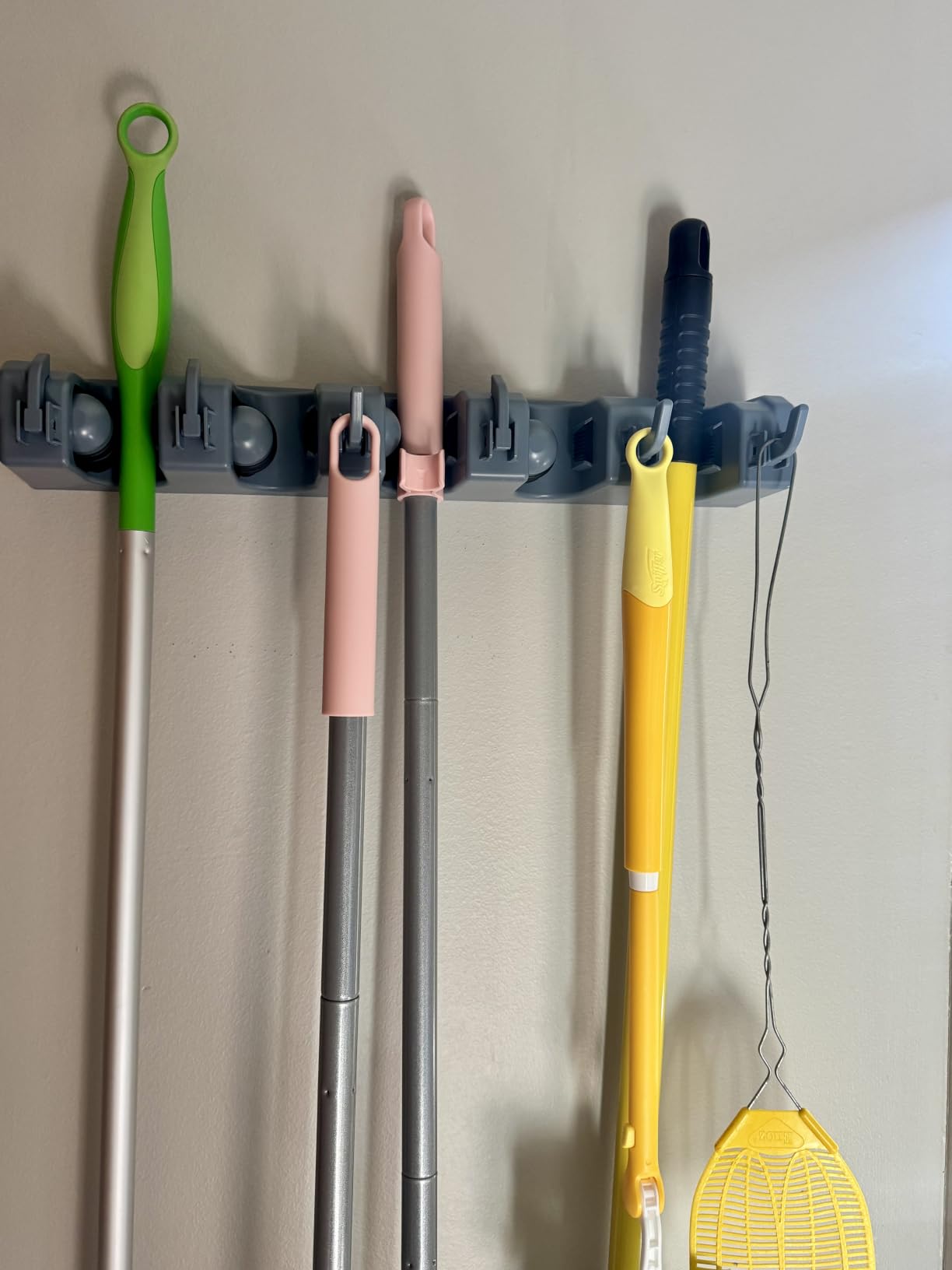 Amazon Basics Rectangular Heavy Duty Wall Mount Broom and Mop Holder, Sturdy Tool Organizer with Hooks and Slots for Garage, Garden, Laundry, Kitchen Organization customer photo 2