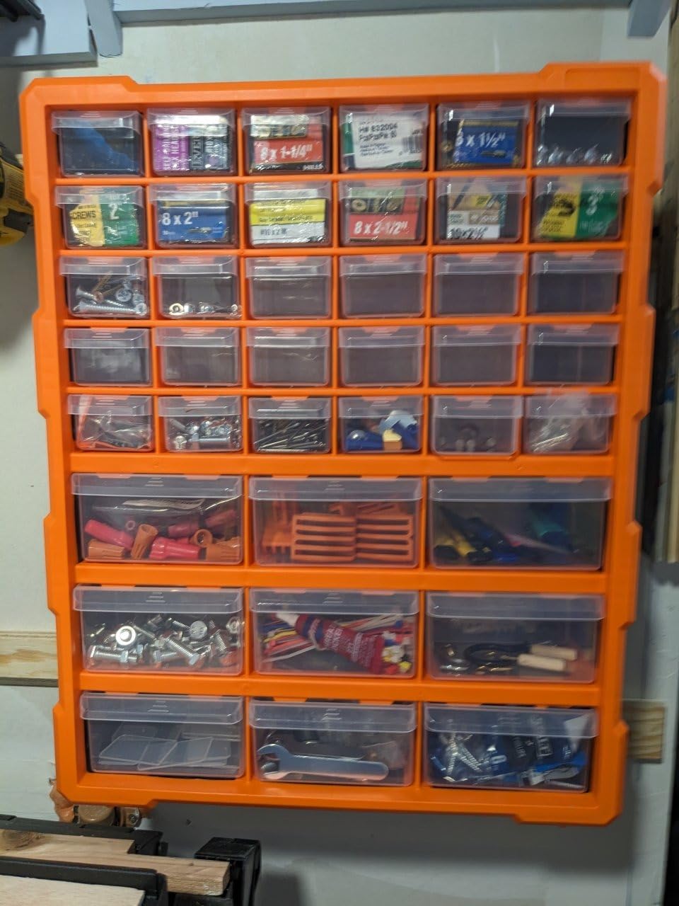 Amazon Basics Wall Mount Hardware and Craft Storage Cabinet Organizer with 39 Drawers, Plastic Garage Organization System with Dividers for Small Parts, Black, Orange, 15