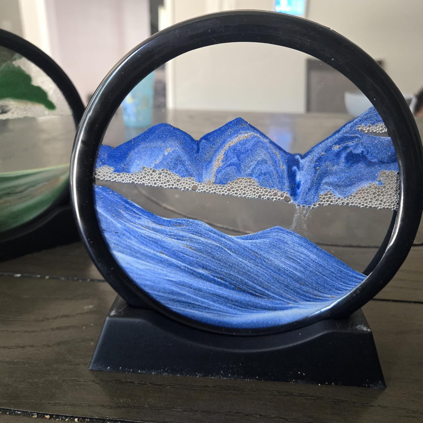SANDCLE Moving Sand Art Picture - Sand Art Liquid Motion 3D Deep Sea Sandscape, Round Glass Frame Display Flowing Sand Relaxing Toy for Desktop Home Office Work Ocean Decor(Black, 7