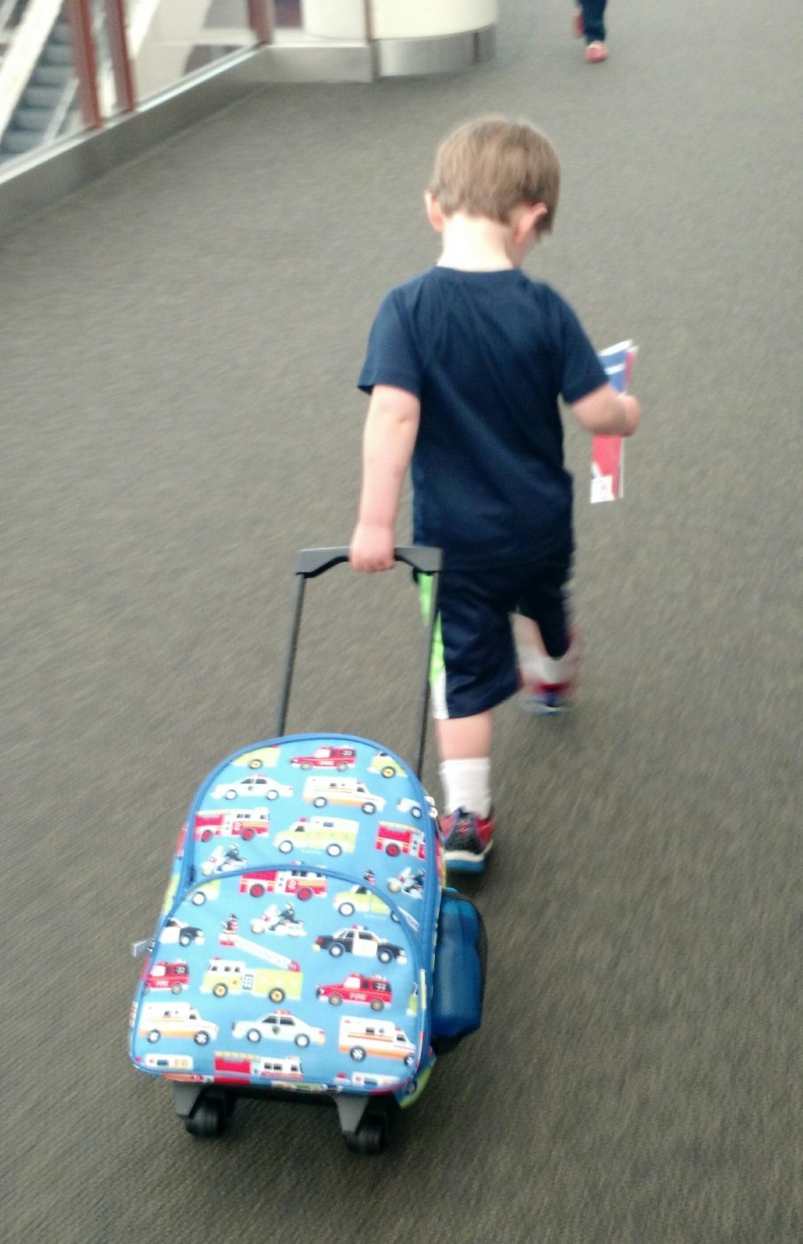 Wildkin Kids 16 Inch Rolling Luggage for Boys & Girls – Lightweight Carry-On Suitcase with Telescoping Handle & Rolling Wheels for School, Travel & Overnight Trips (Trains, Planes, and Trucks) customer photo 1