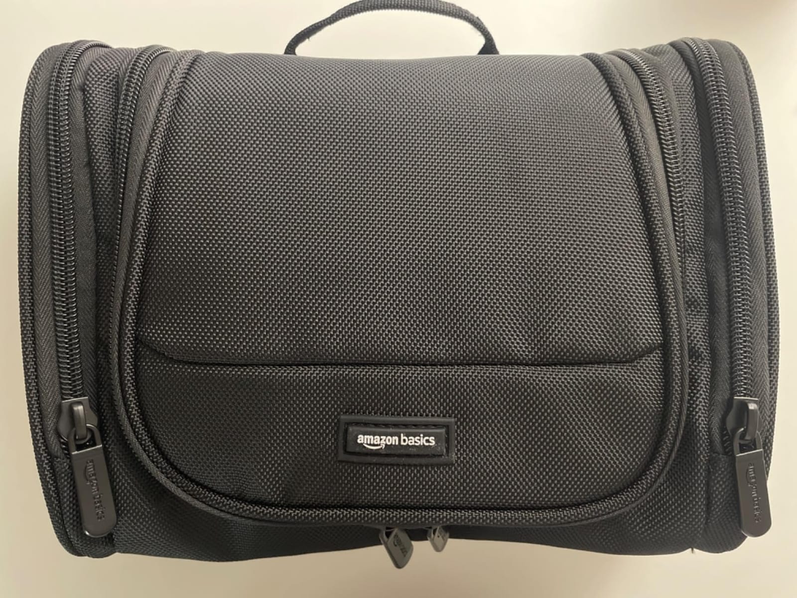 Amazon Essentials Spacious Toiletry Bag, Hanging Cosmetic Dopp Kit with Multiple Compartments, Durable Polyester, Large Capacity Storage, Compact Design, Black (Previously Amazon Basics) customer photo 1