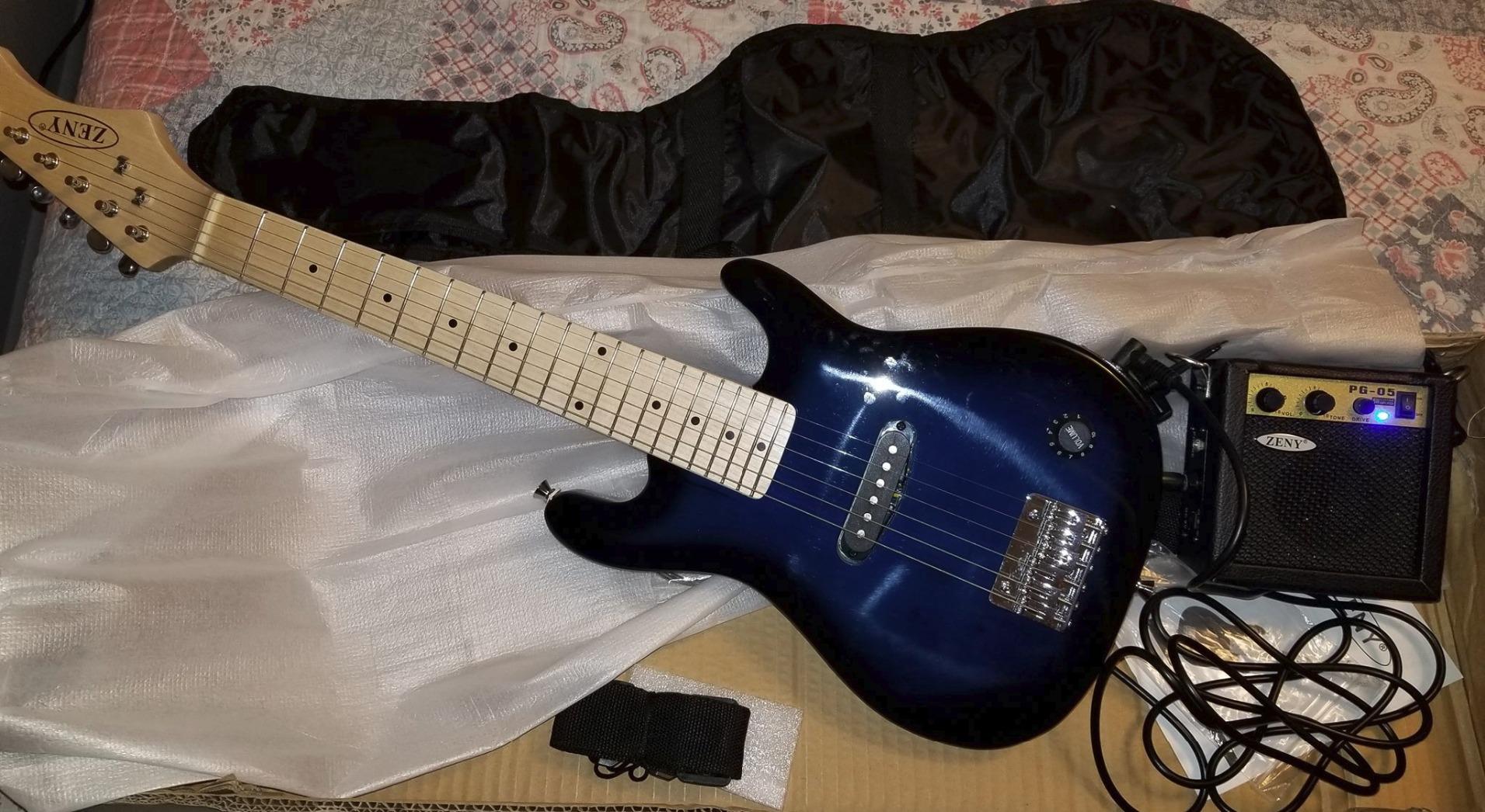 30 Inch Electric Guitar, Starter Kit for Kids with Amplifier,Picks, Gig Bag, Shoulder Strap, Cable & Accessory Kit,Solid Wood Body, Blue customer photo 2
