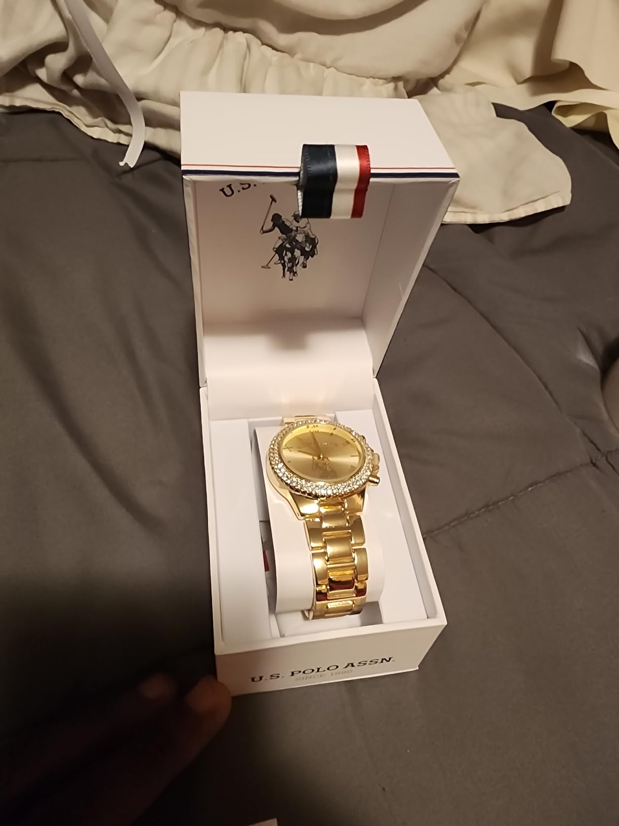 U.S. Polo Assn. Women's Analog Watch – Gold-Tone Dial with Crystal-Embellished Bezel and Stainless Steel Bracelet – Elegant, Durable, and Adjustable Fit for Wrists 5.5