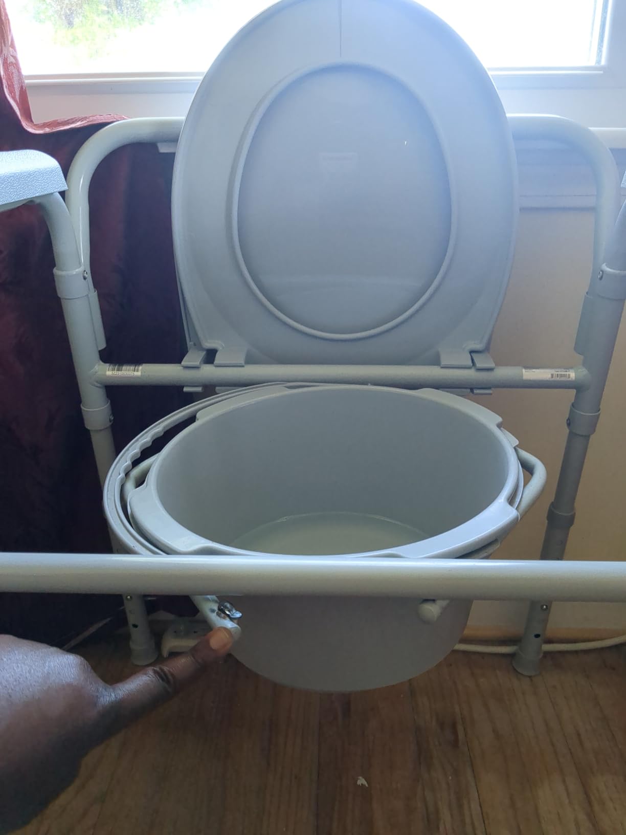 McKesson Folding Commode Chair with 7.5 qt Bucket, 13 1/2 in, 1 ct | Seat Width, Adjustable Height customer photo 1