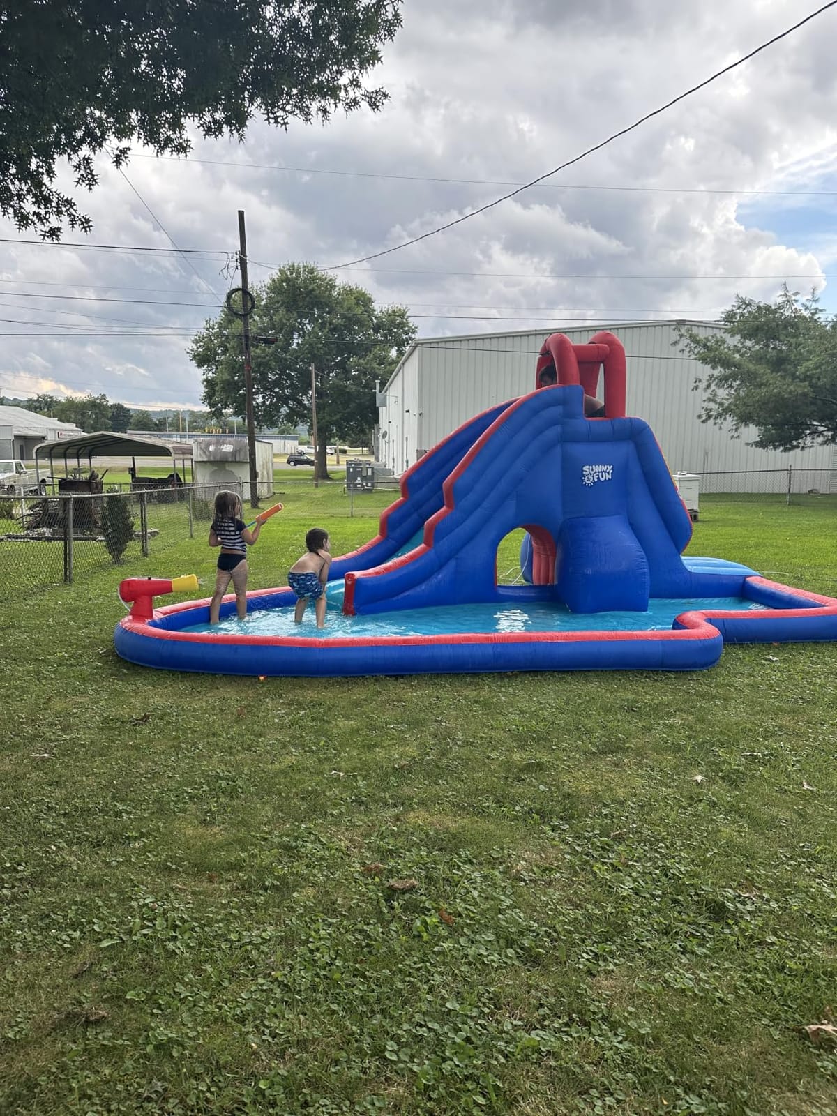 Sunny & Fun Deluxe Inflatable Water Slide Park with Climbing wall & Tunnel customer photo 1