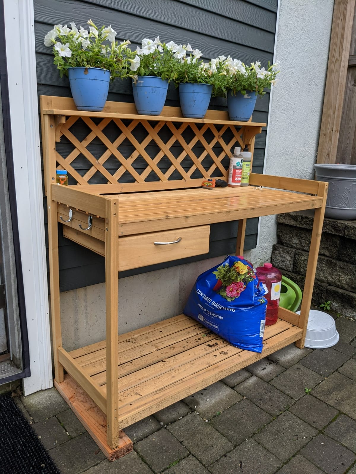 Best Choice Products Outdoor Garden Potting Bench, Wooden Workstation Table w/Cabinet Drawer, Open Shelf, Lower Storage, Lattice Back - Gray customer photo 1