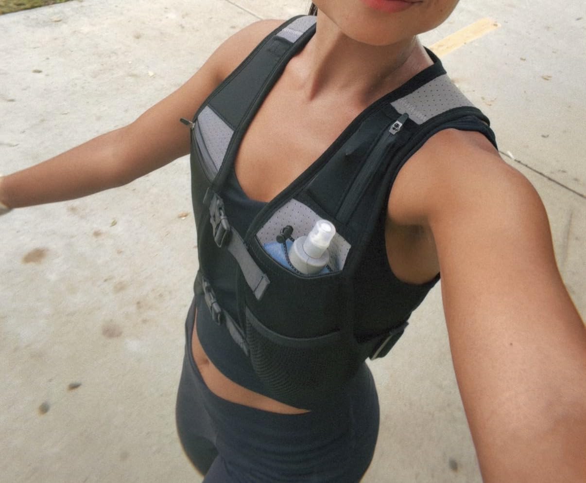 Running Phone Holder Vest with 500ml/17oz Water Bottle | Reflective Hydration Vest | Adjustable | Light | 6 Pockets for Running Accessories | Unisex customer photo 1