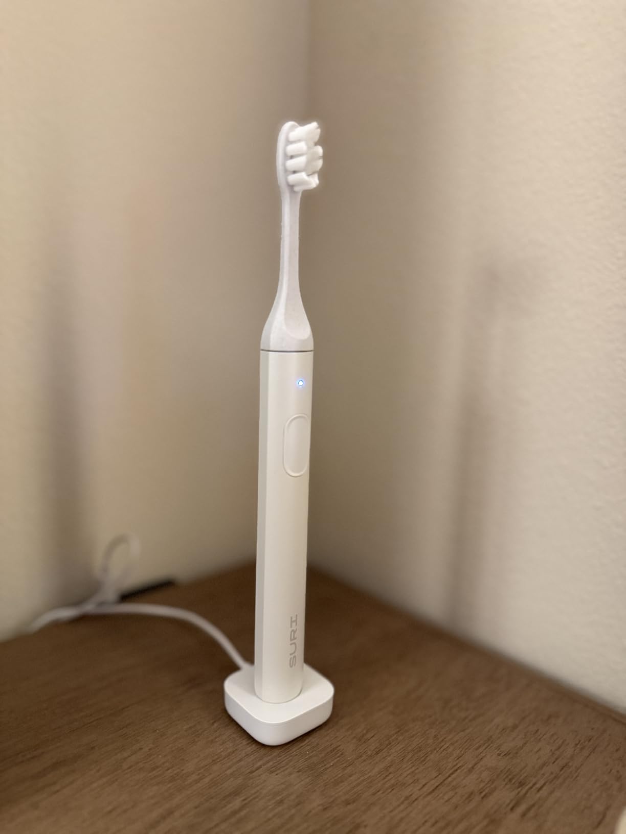 SURI Pro Sonic Electric Toothbrush | Over 4+ Weeks Battery | Pressure Sensor | Aluminium Body | 2-Minute Timer | Plant-Based Head | Black customer photo 1