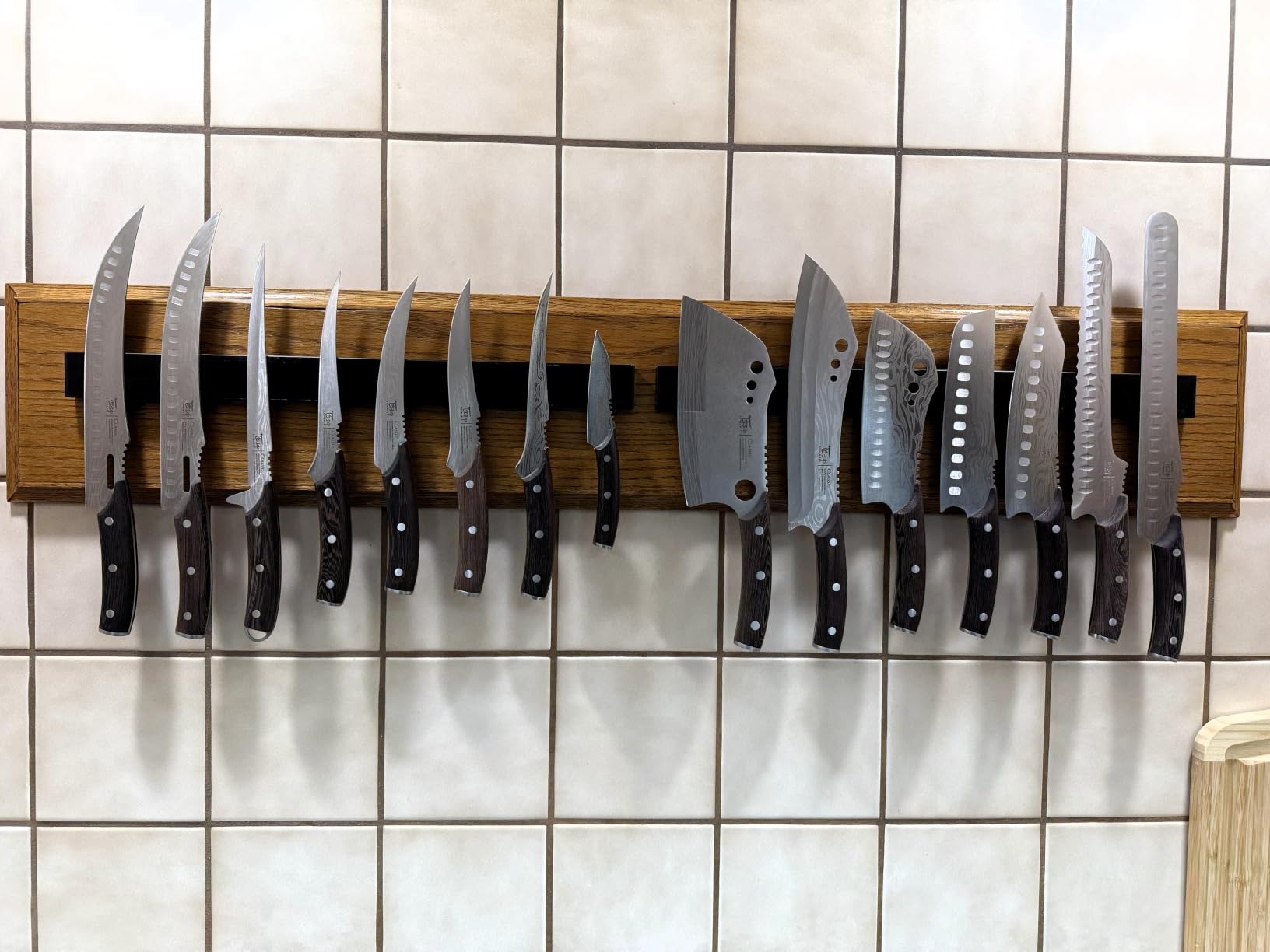 Dmore magnetic knife holder for wall—with 2 hooks, No Drilling 10 Inch black knife magnetic strip, Powerful knife magnet rack, include Adhesive Tape and screws for Knives, Utensils, and Tools customer photo 2
